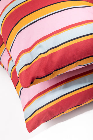 karavan clothing fashion spring summer 24 that moment homeware collection striped pillowcase red orange