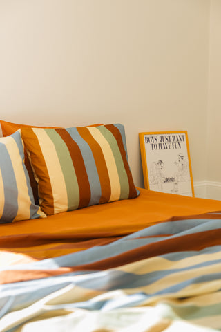 karavan clothing planet homeware collection fall winter 24 25 percale fitted sheet orange