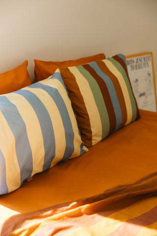 karavan clothing planet homeware collection fall winter 24 25 pillow case ivory blue brown mint stripes