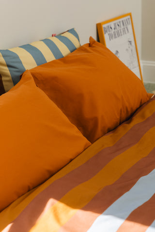 karavan clothing planet homeware collection fall winter 24 25 pillow case orange