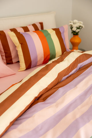 karavan clothing planet homeware collection fall winter 24 25 pillow case brown lilac green stripes