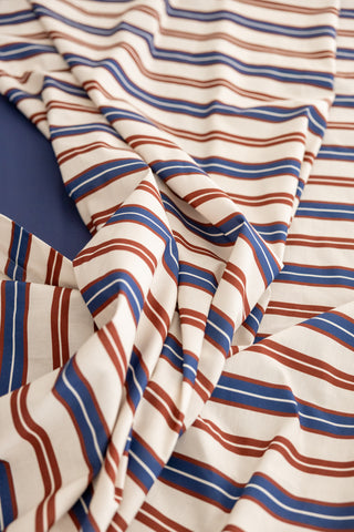 karavan clothing planet homeware collection fall winter 24 25 flat sheet blue bordeaux ivory stripes