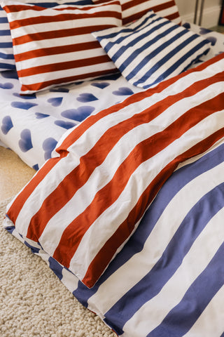 karavan clothing planet homeware collection fall winter 24 25 duvet cover blue red stripes