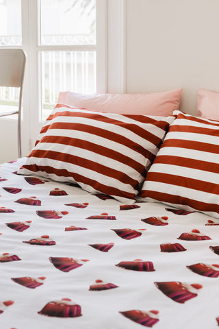 karavan clothing planet homeware collection fall winter 24 25 pillow case bordeauxt stripes